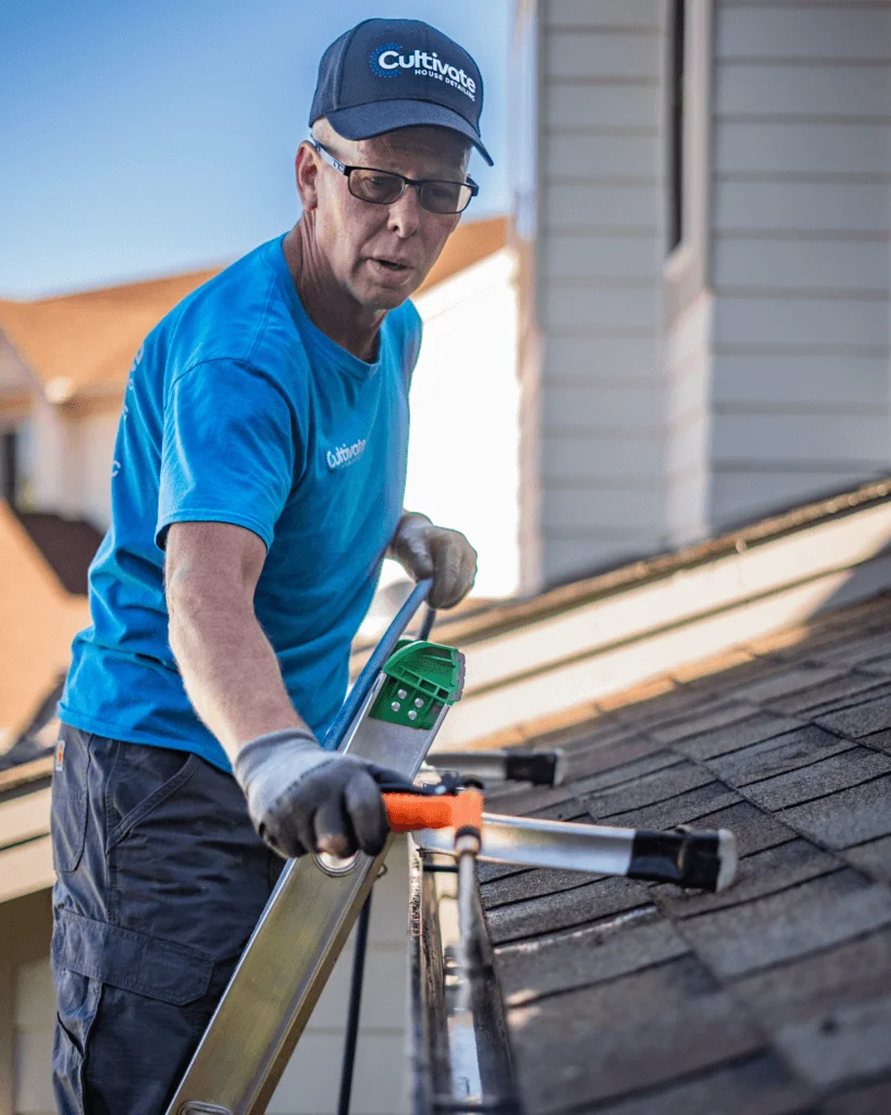 A picture of professional gutter cleaning services by the Cultivate House Detailing team.